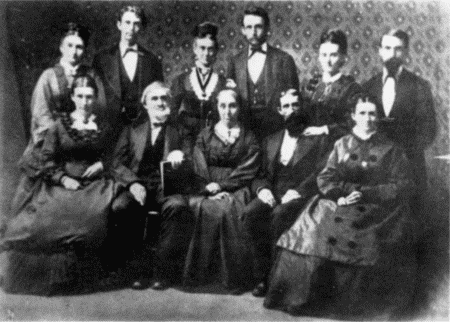 Standing: Matt (Mrs. W. B. Smith), R. A. Carr, Mrs. O. A. Carr, O. A. Carr, Mrs. H. P. Carr, Owen Carr.
Sitting: Mary (Mrs. Goddard), Wm. Carr, Mrs. Wm. Carr, Capt. H. P. Carr, Minnie (Mrs. Jno. W. Fox, Sr.)
HOME AGAIN&mdash;ALL HERE