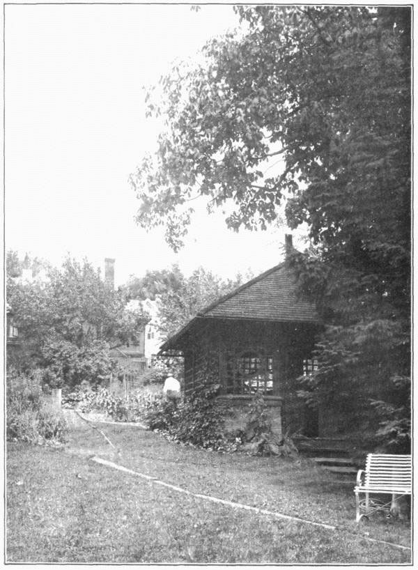 XI. The back yard, with
summer house, and gardens beyond.